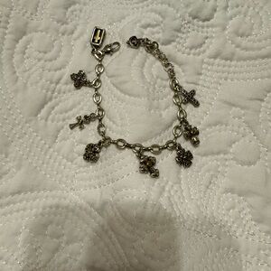 Eternity Crosses bracelet by Brighton jewelry. 8 unique charms, about 8 1/2”.